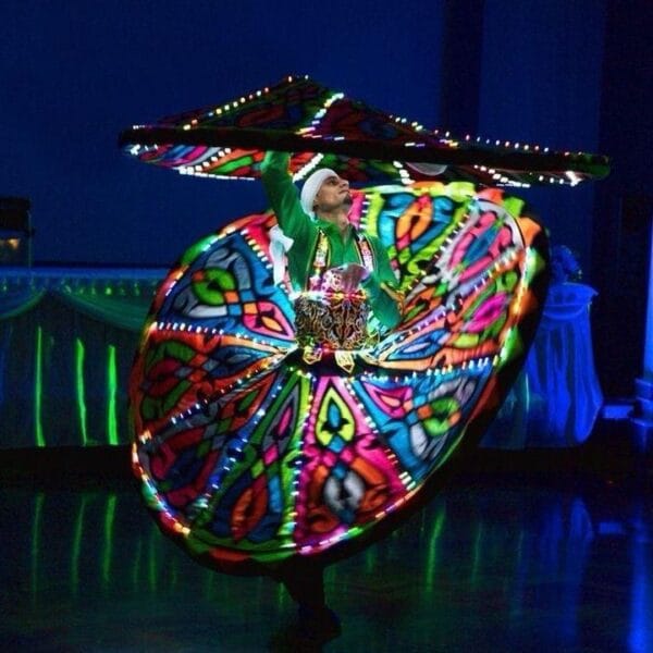Super Safari Hurghada adventure featuring a traditional LED Tanoura dance performance during the oriental show