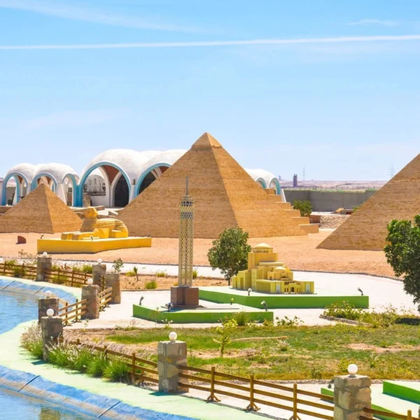 Miniature replicas of the Giza Pyramids, Great Sphinx, and Cairo Tower at Mini Egypt Park in Hurghada.